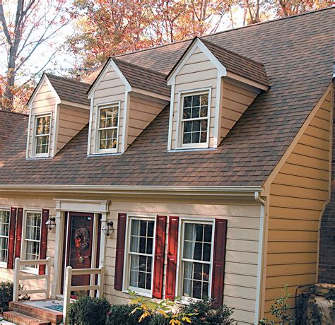 brown metal roof white house|reddish brown roof house colors.